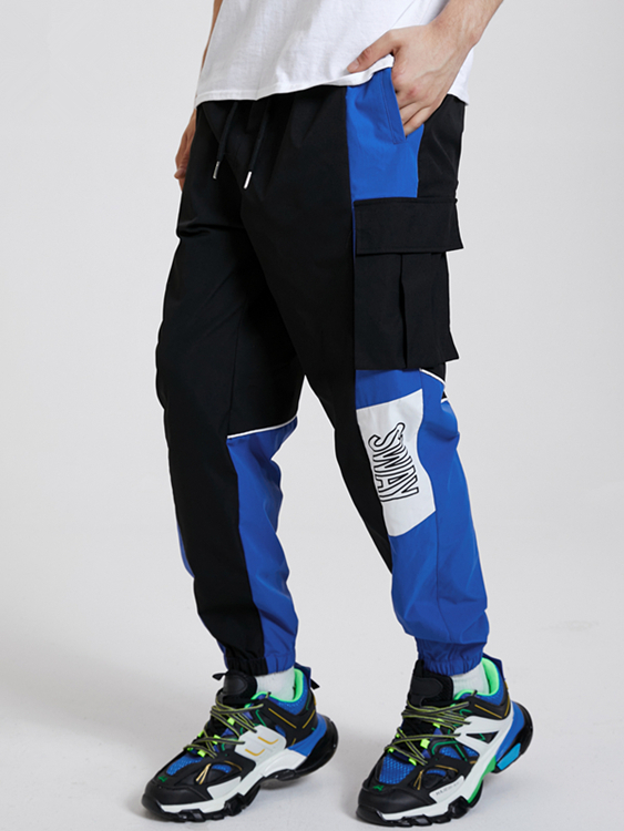 KOYYE Men Color Blocking Letter Print Casual Pants